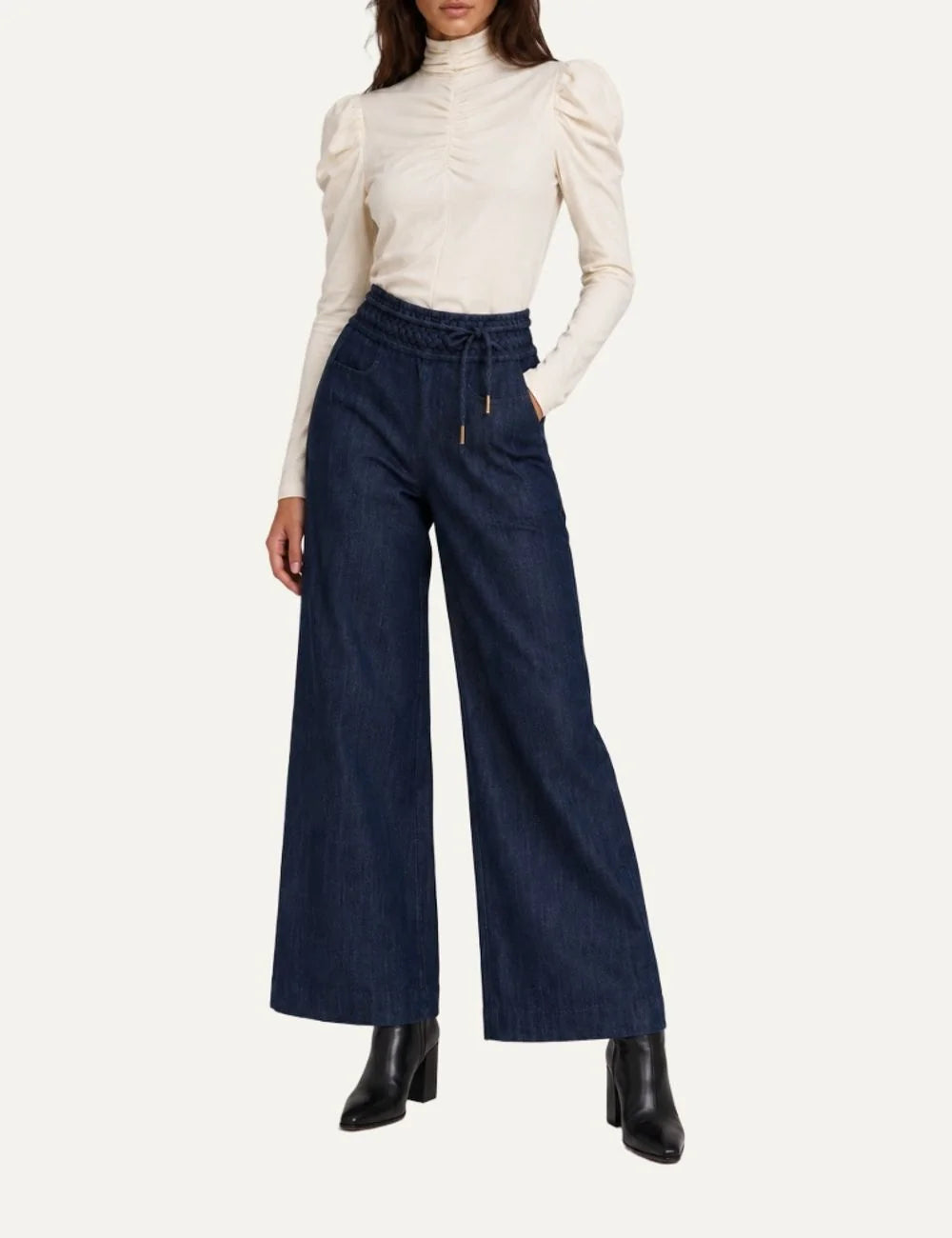 Scarlet Poppies women's Wayne dark blue denim trousers featuring wide straight legs, origami-inspired textured waistband, adjustable drawstring with gold-tone tips and side pocketsfull body