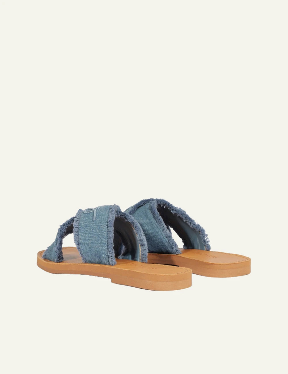 Schutz denim flat sandal with frayed X straps and logo detail back view