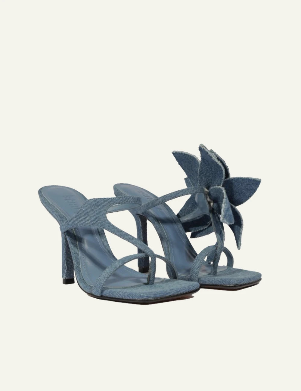 Schutz denim patchwork mule sandal blue with thin heel front detail view
