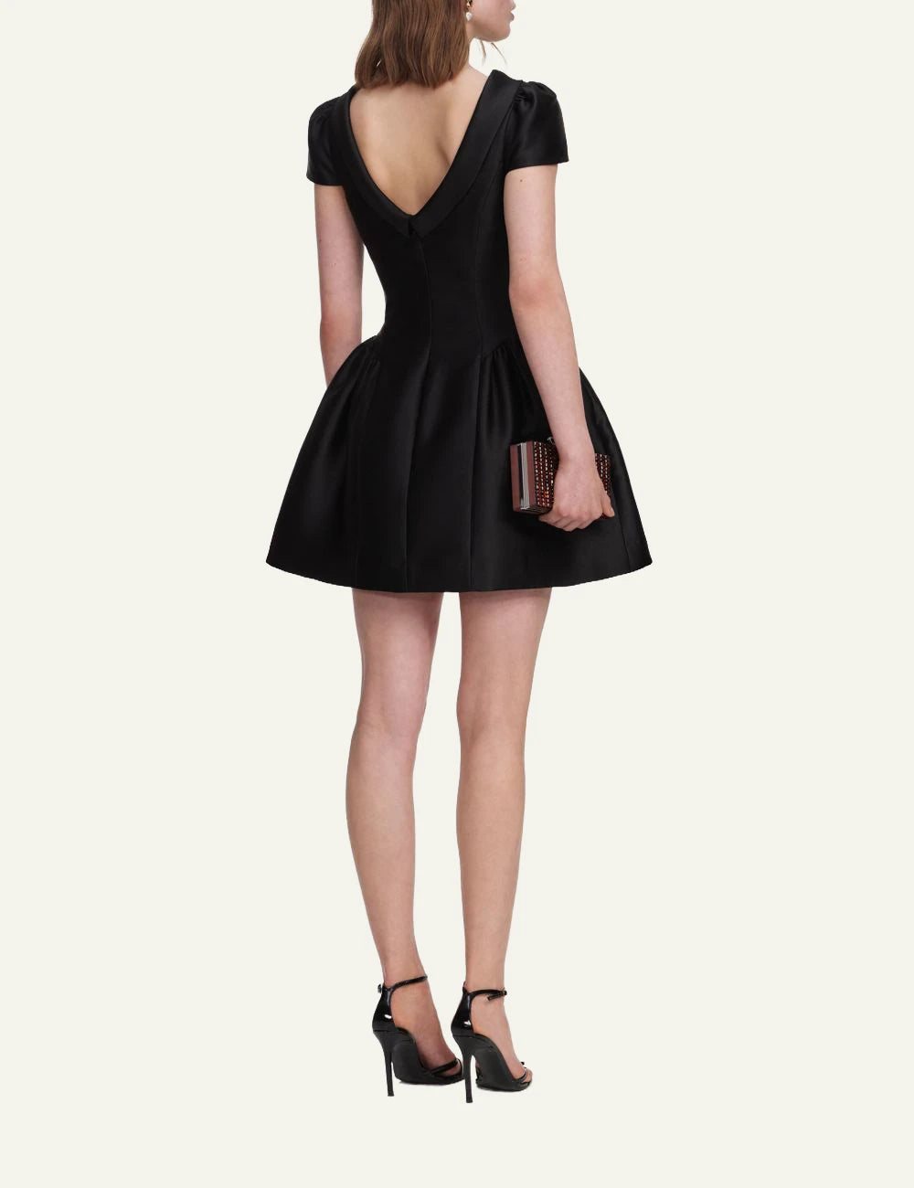 Black taffeta mini dress with boat neckline, fitted waist and voluminous flared skirt by Self-Portrait back