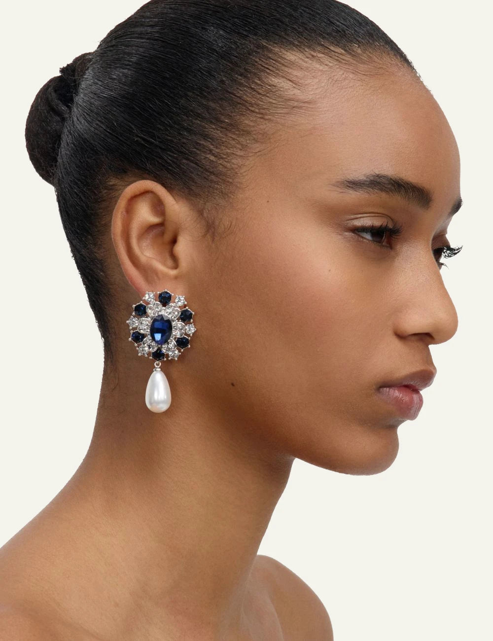 Self-Portrait blue crystal and faux pearl drop earrings side view worn by model