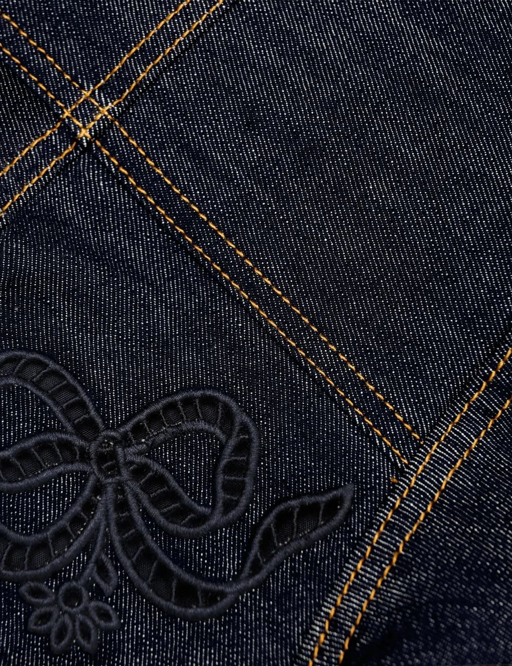 Self-Portrait denim mini dress with embroidered bow details and flared skirt  detail