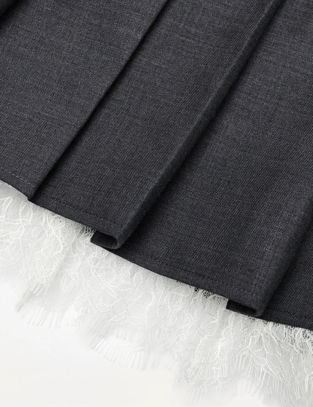 Grey pleated mini skirt with lace hem and A-line silhouette by Self-Portrait detail