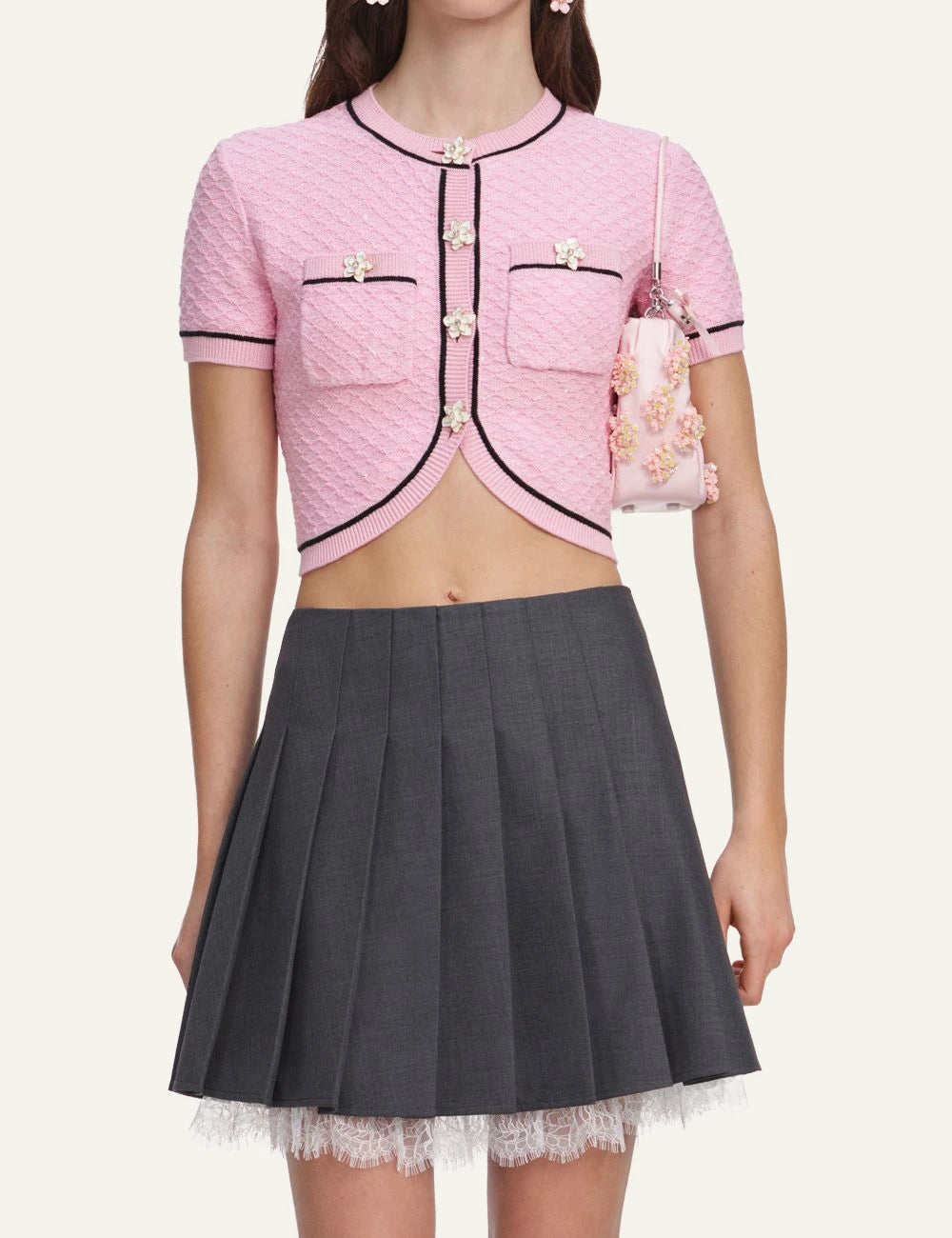 Pink cropped knit top with floral buttons and contrast trim by Self-Portrait