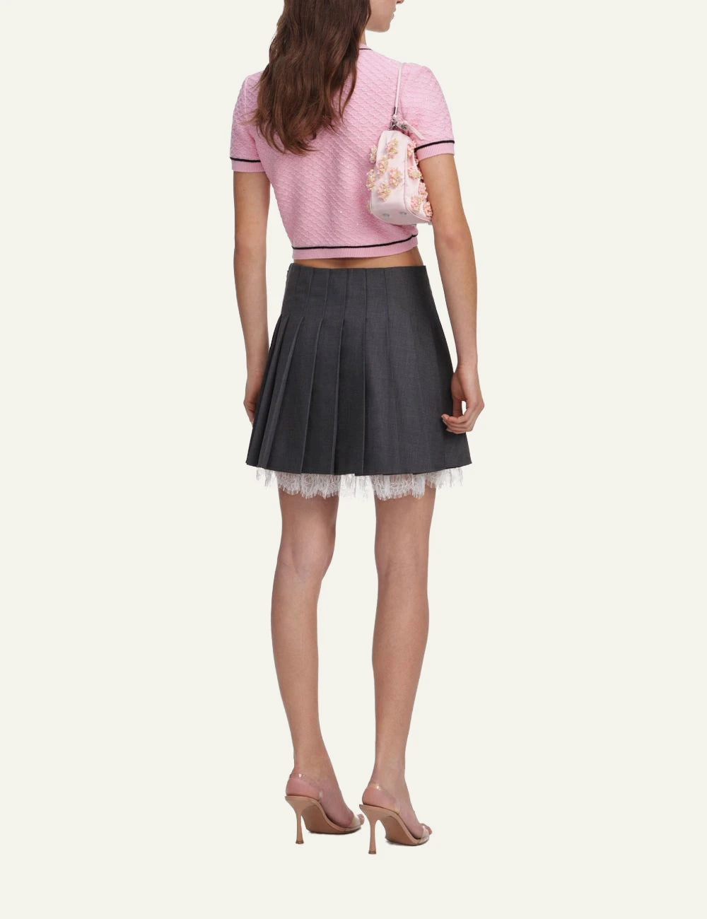 Pink cropped knit top with floral buttons and contrast trim by Self-Portrait back