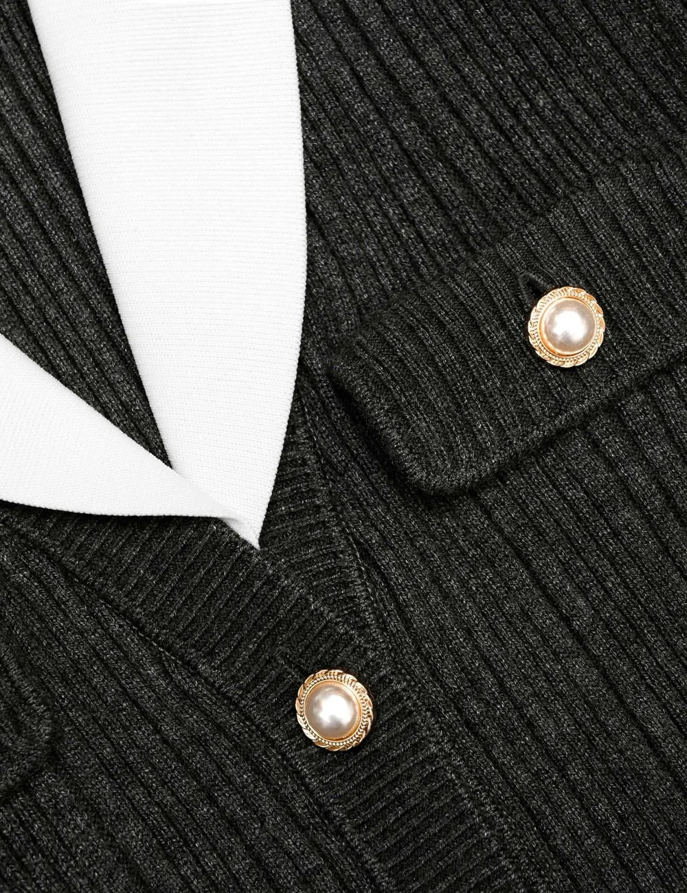 Pink cropped knit top with floral buttons and contrast trim by Self-Portrait detail