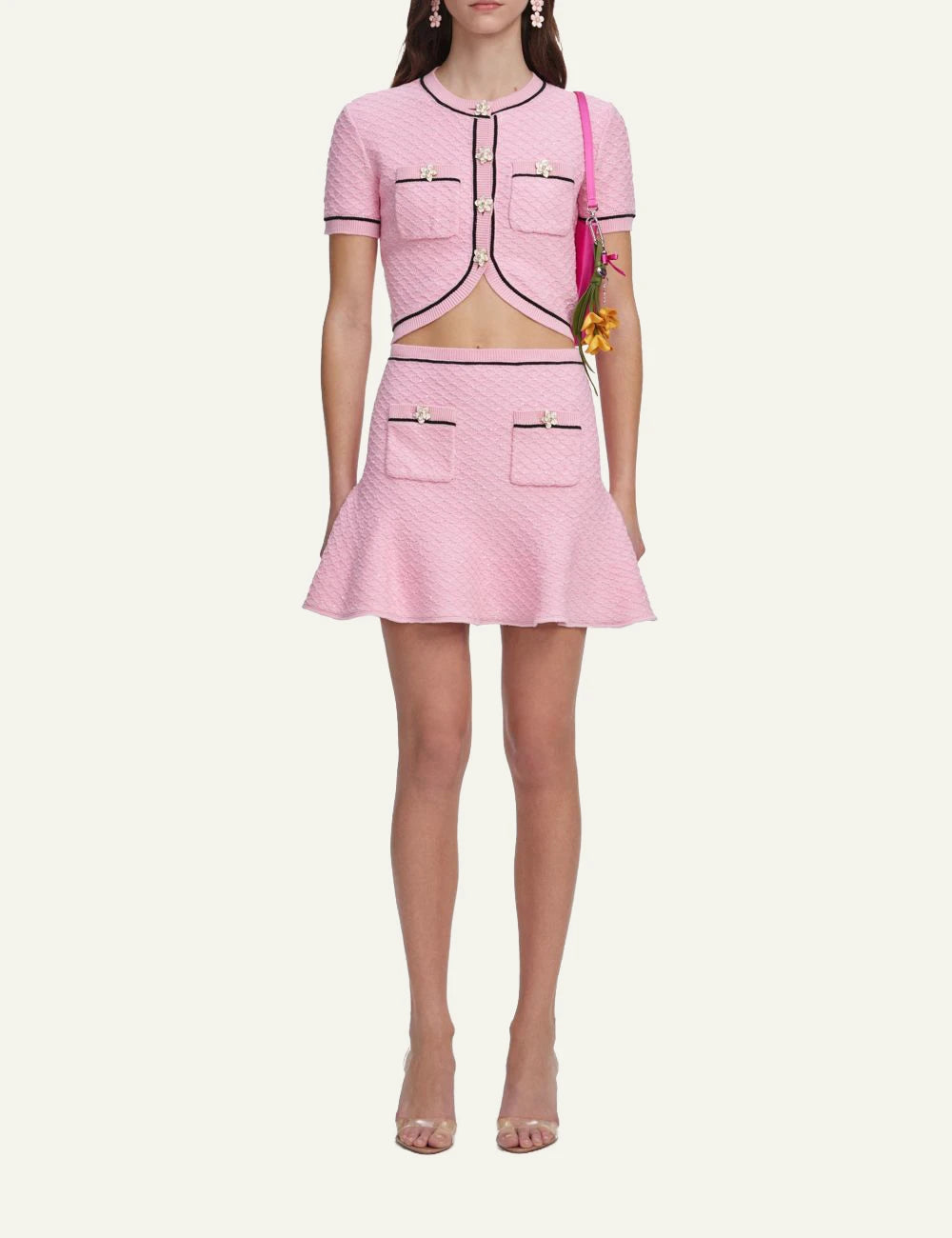 Pink textured mini skirt with contrast trim, floral buttons and flared hem by Self-Portrait full body