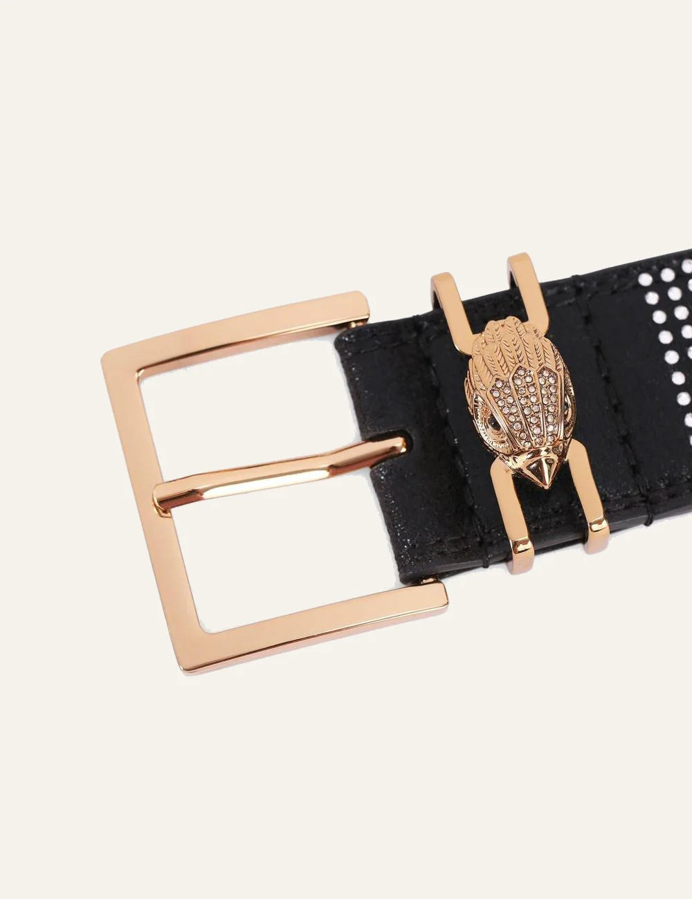 Kurt Geiger Shoreditch Gem belt rose gold buckle eagle head close up