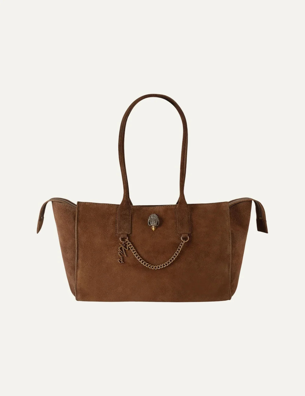 Kurt Geiger women's brown suede shopper tote bag with long shoulder handles, antique gold eagle head and decorative chain detail.