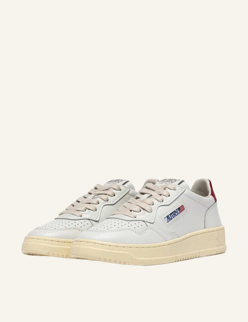 Women's Autry Medalist white leather sneakers with red heel tab and rubber angled