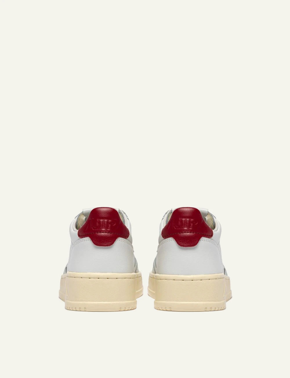 Women's Autry Medalist white leather sneakers with red heel tab and rubber back