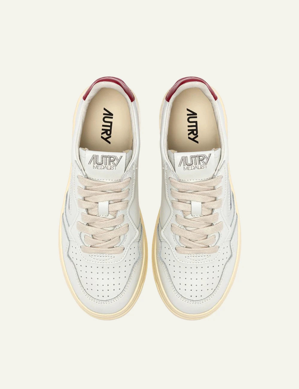 Women's Autry Medalist white leather sneakers with red heel tab and rubber sole top