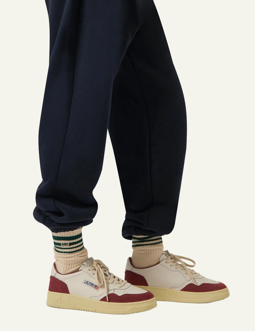 Autry women’s white leather sneakers with burgundy suede details model