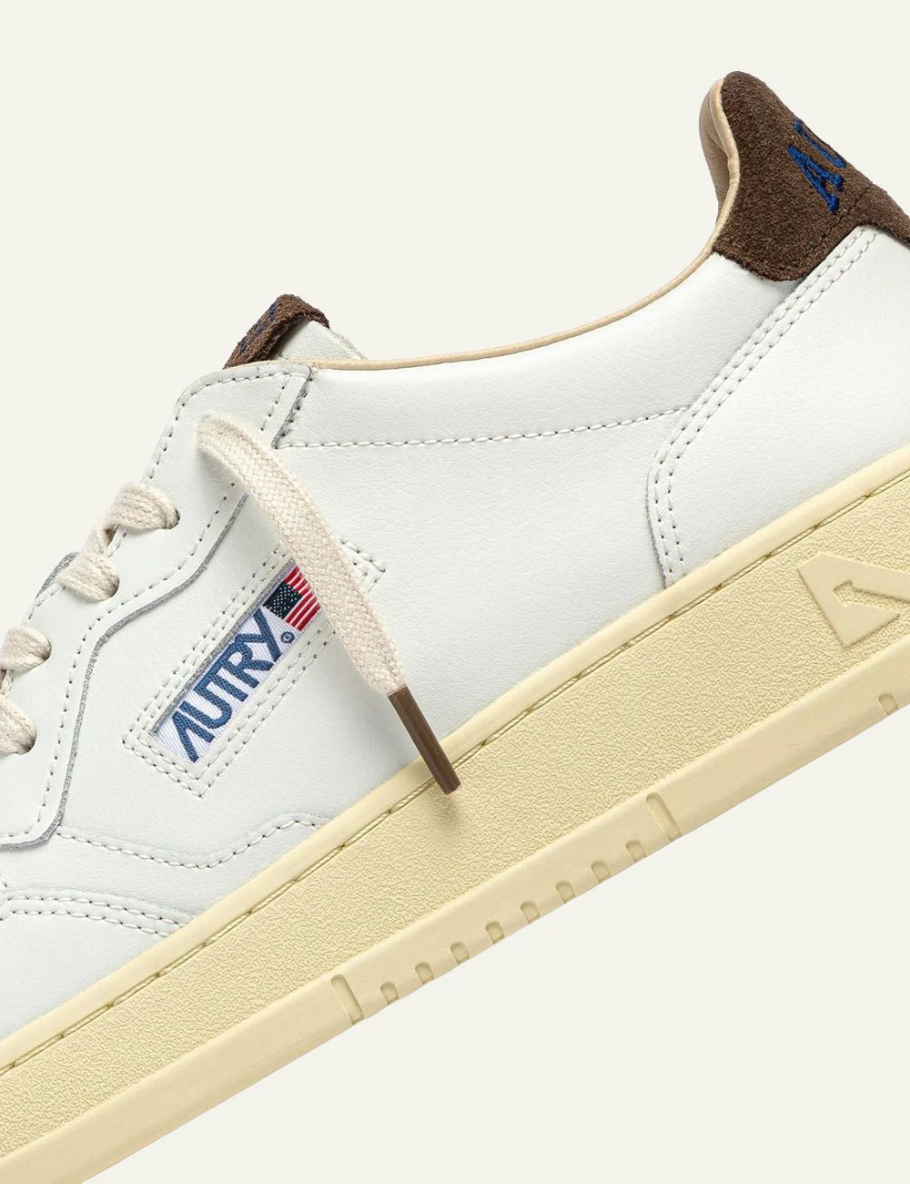 Autry Men’s White Leather Sneakers With Brown Suede Heel Tab detail