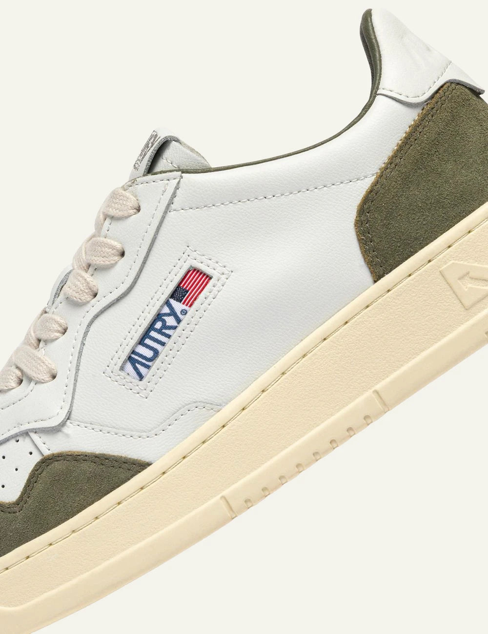 Autry Men’s White Leather And Green Suede Sneakers logo