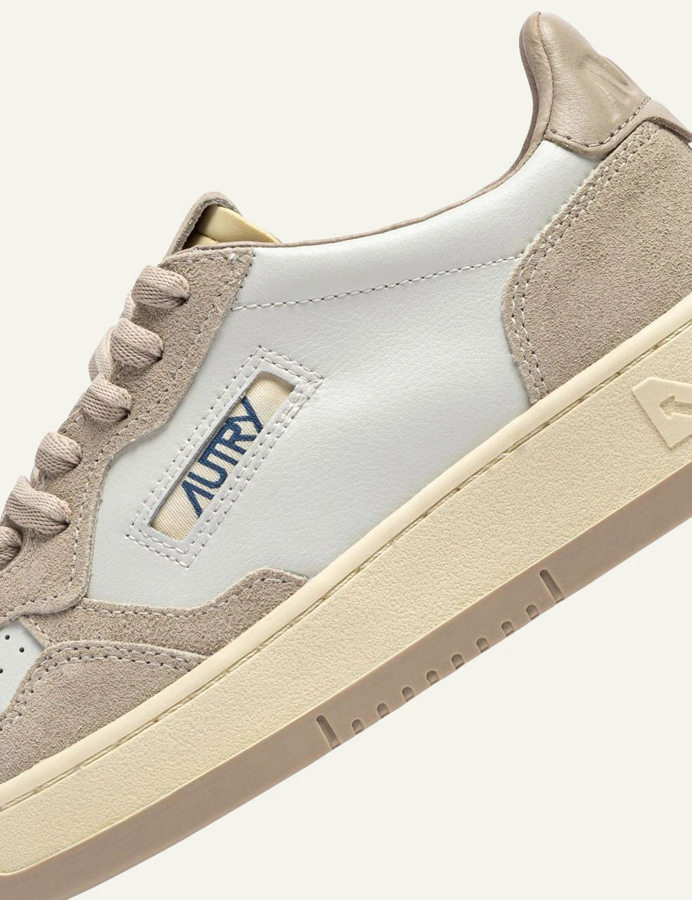 Autry women’s white leather sneakers with beige suede details logo