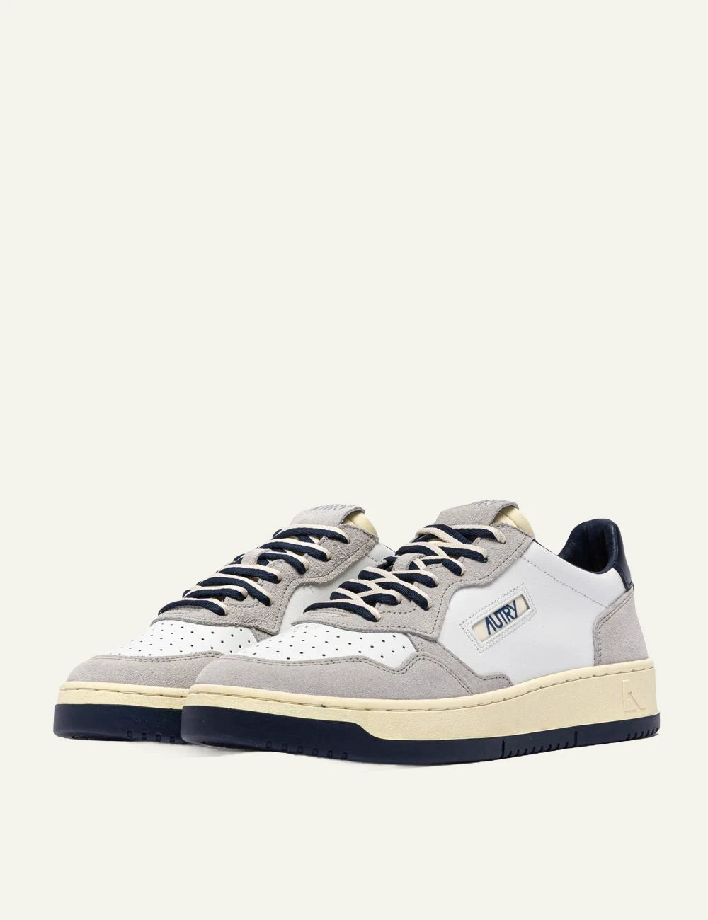 Men's Autry Medalist white leather and light grey suede sneakers with navy blue heel angled