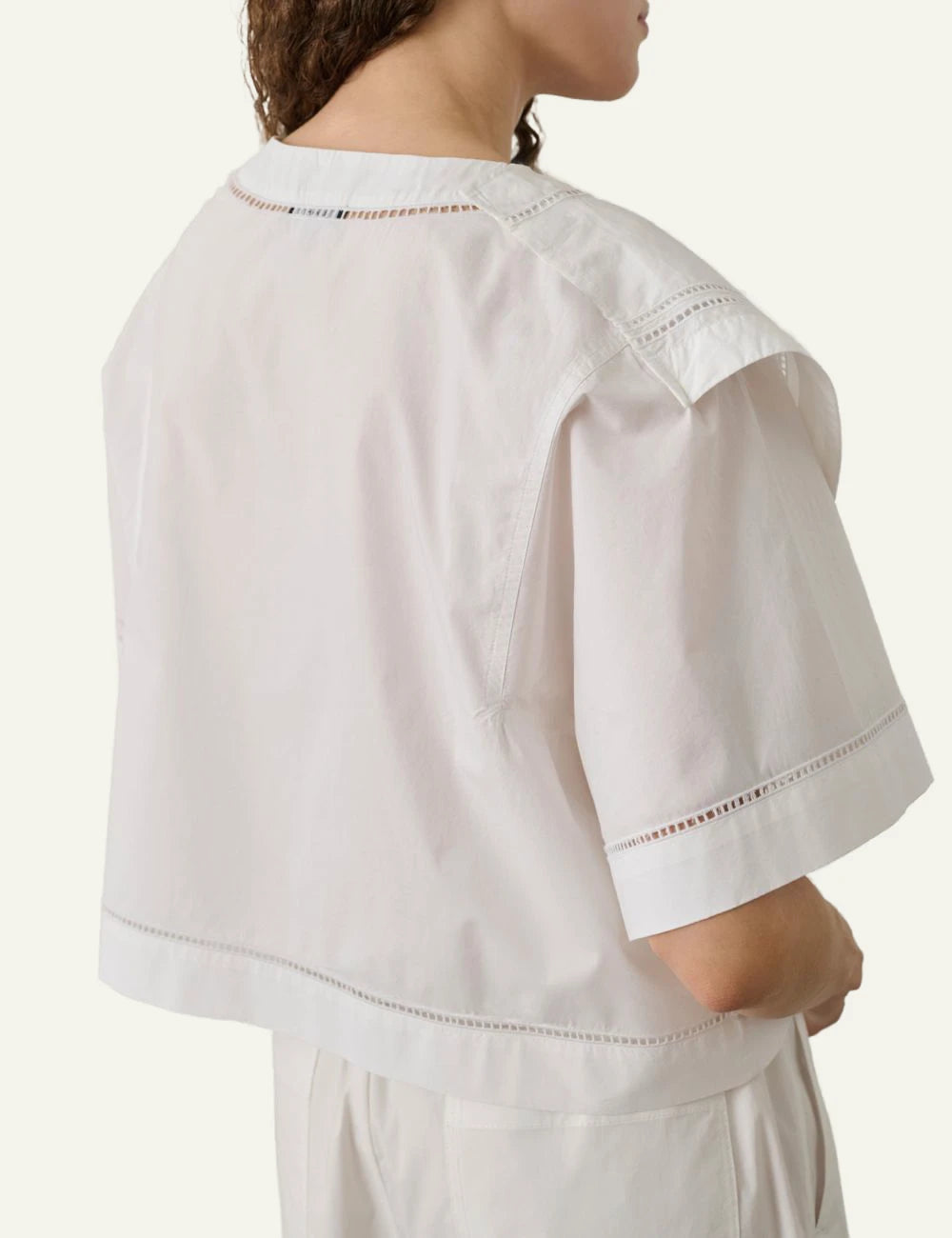 Soeur Irene blouse white cotton embroidered asymmetrical hem layered side