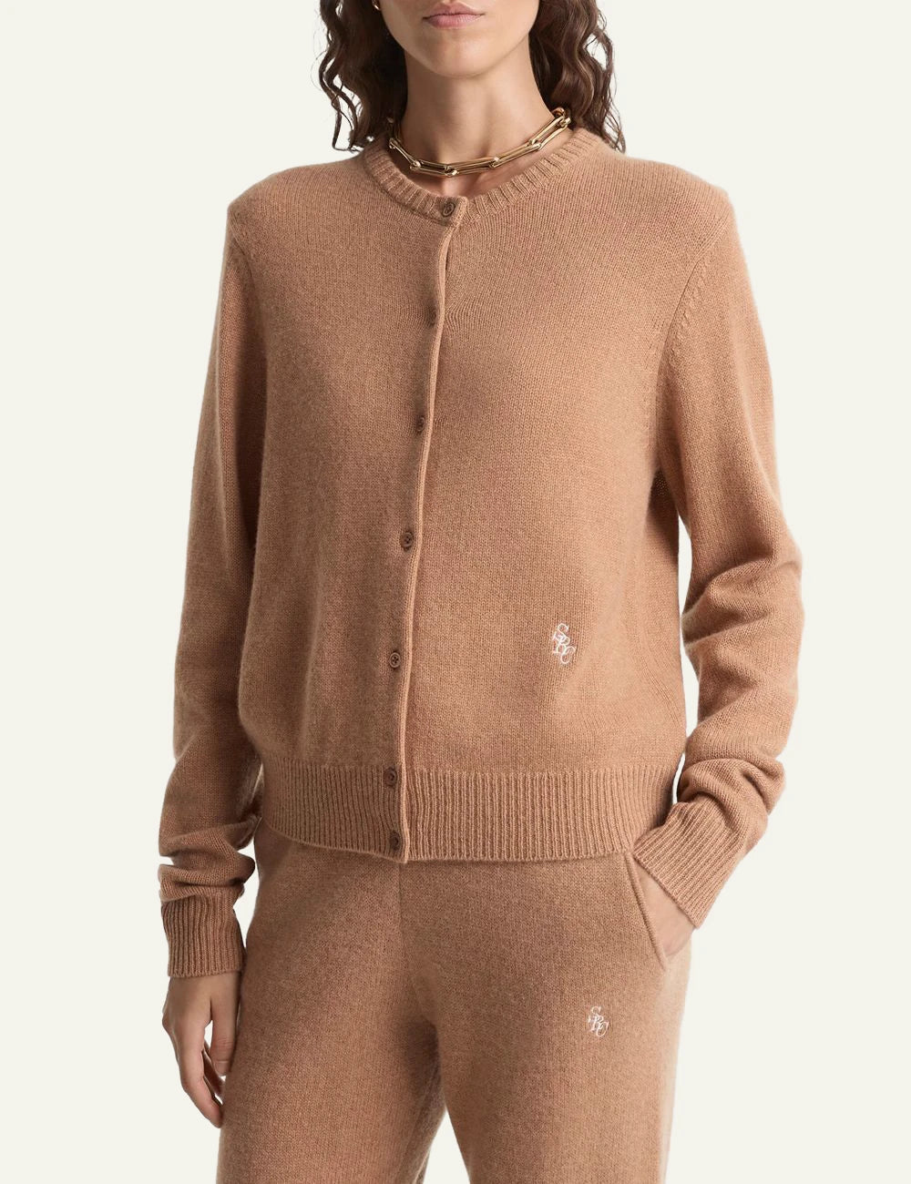 Sporty and Rich camel cashmere cardigan embroidered logo front view