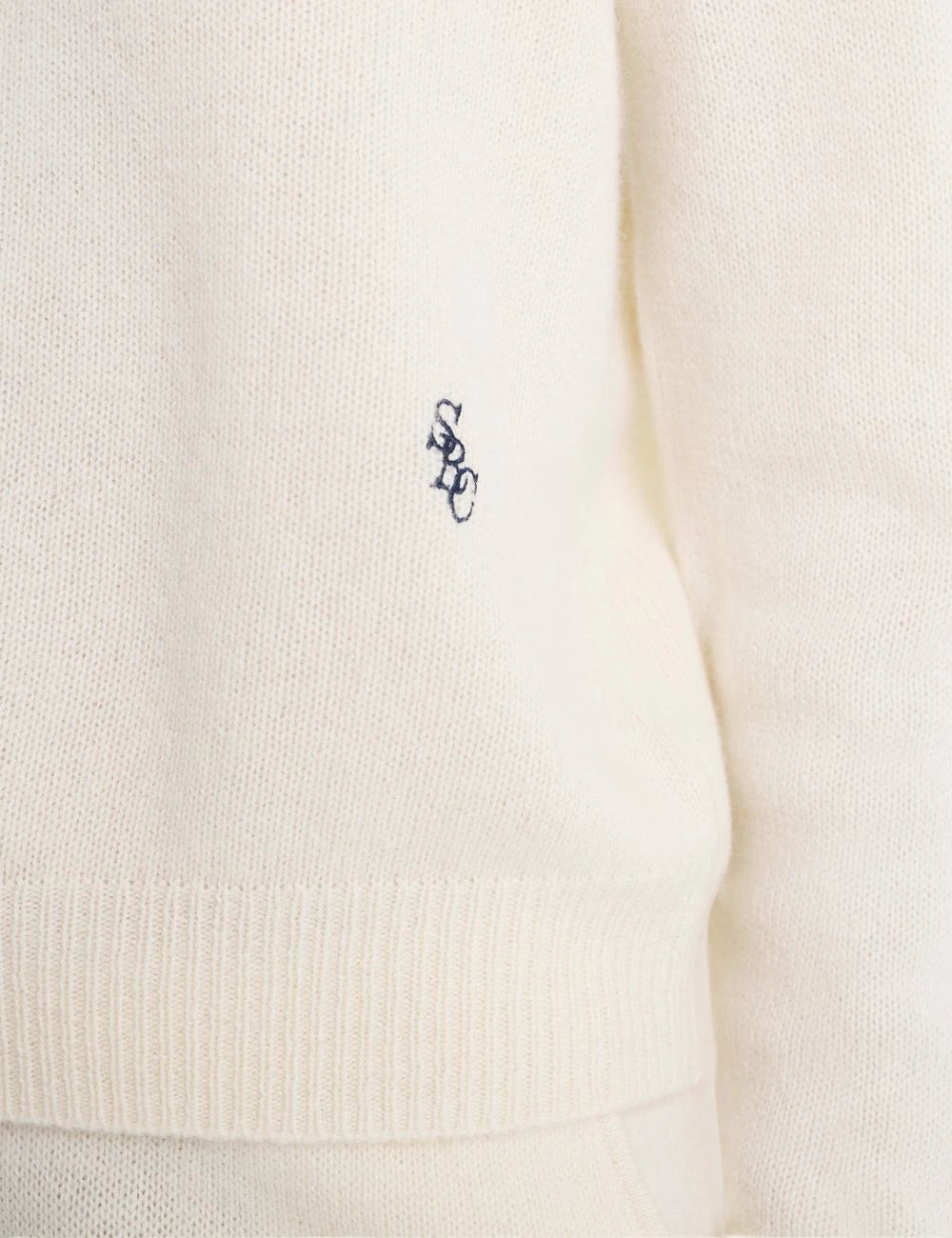 Sporty and Rich cropped cashmere sweater ecru front detail view