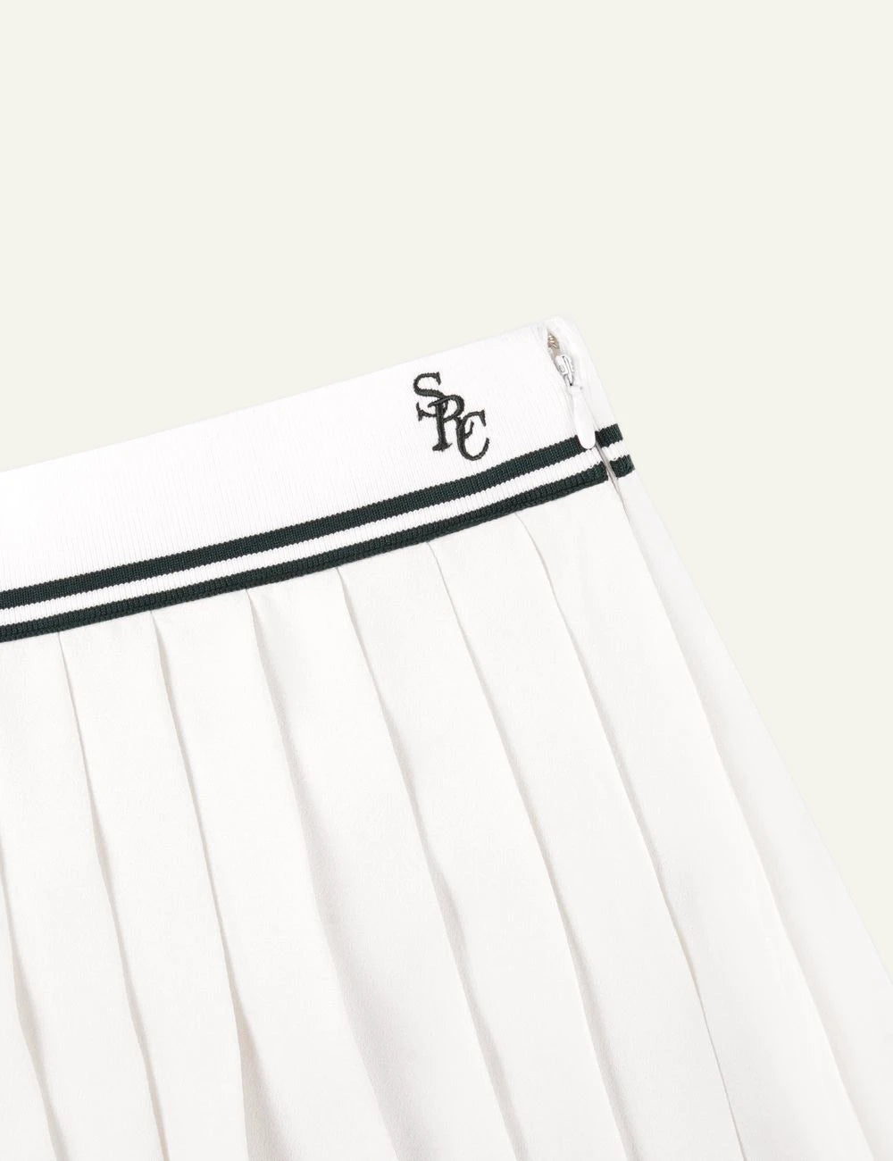 Sporty &amp; Rich SRC Abigail skirt ecru forest pleated front detail view