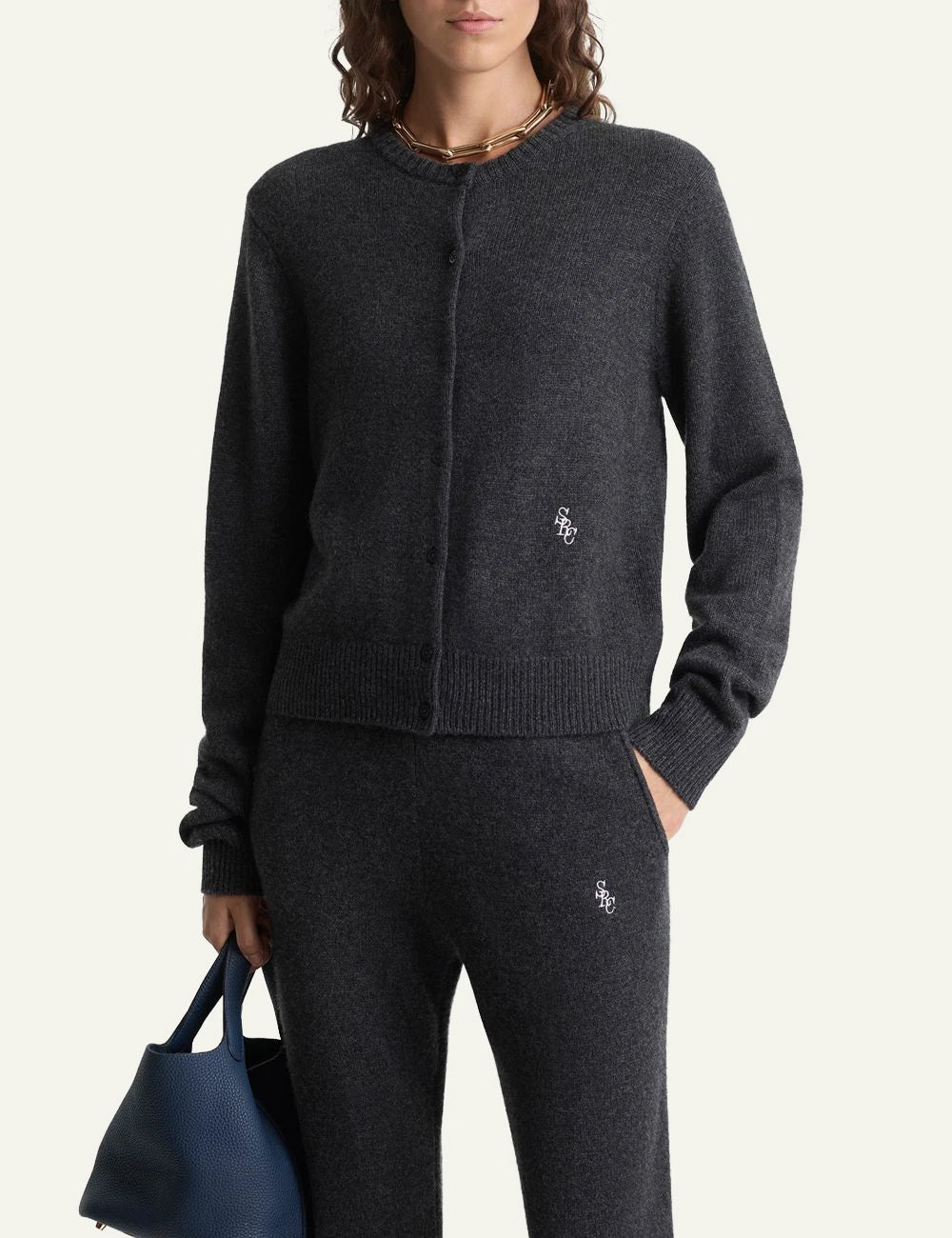 Sporty and Rich charcoal cashmere cropped cardigan front model view