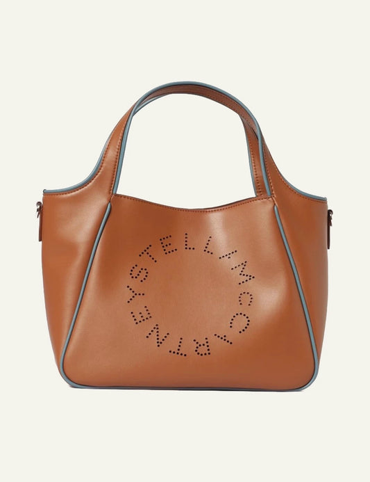Stella McCartney Logo tote bag in tan vegan leather with perforated circular logo and contrast blue trim, front view
