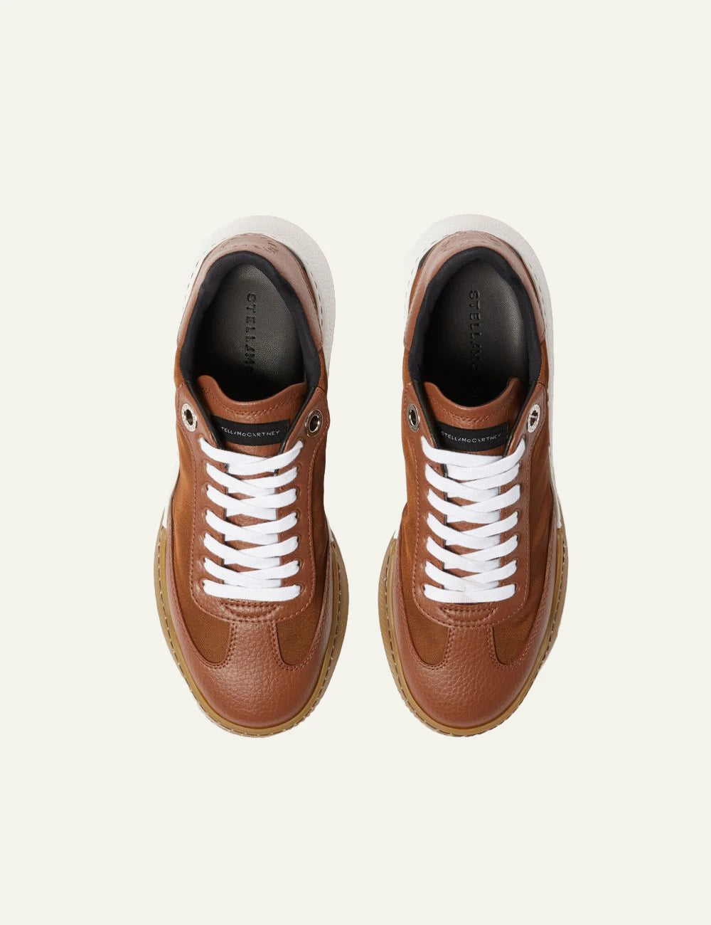 Stella McCartney platform sneaker in brown with white laces and chunky white sole, top view