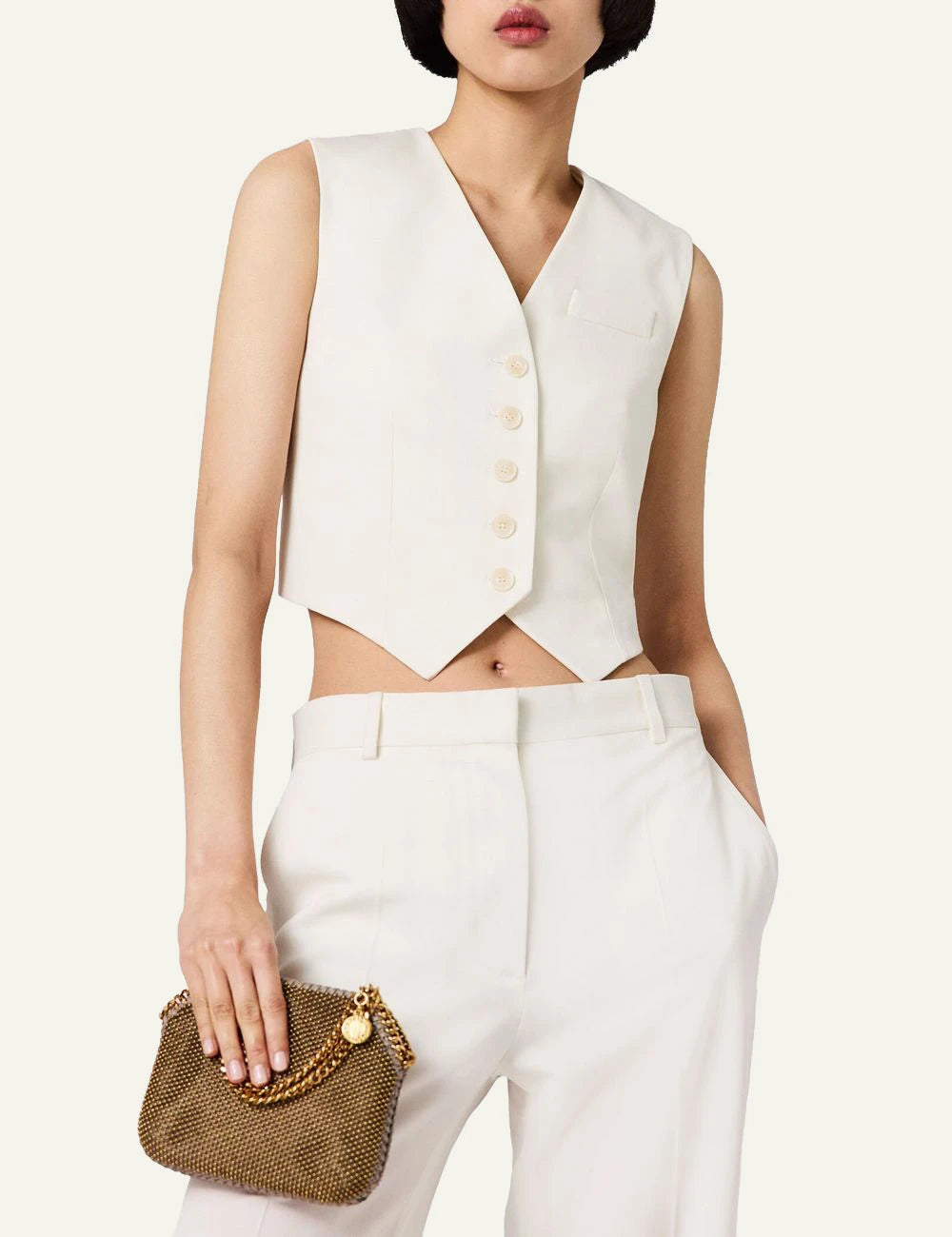 Stella McCartney wide leg trousers in off-white with high waist and front crease, front detail view