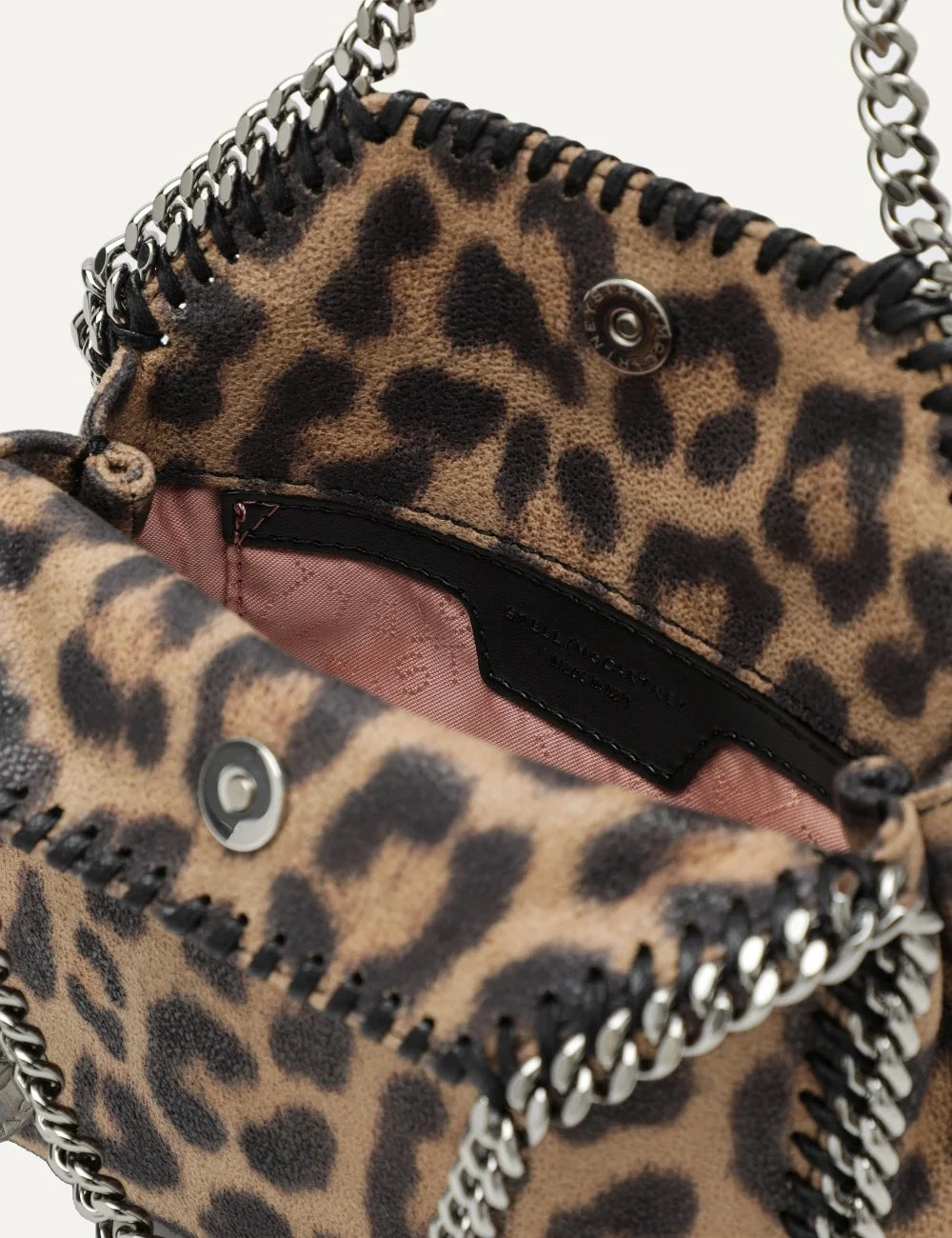 Stella McCartney women leopard print shaggy vegan leather mini tote bag with ruthenium chain handles and shoulder strap top