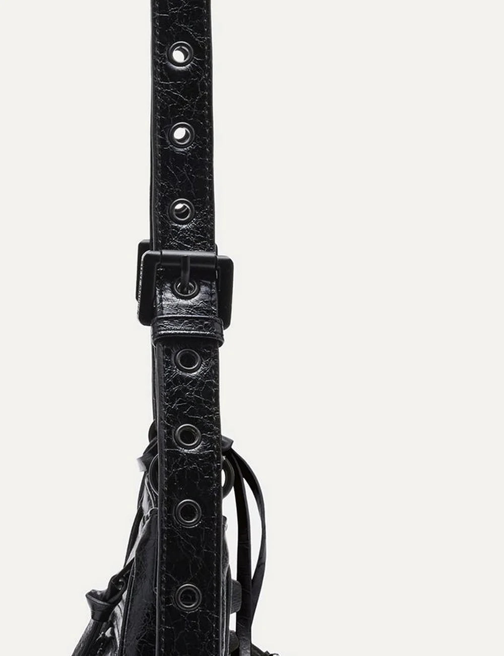 Steve Madden Bglowing women's black glossy textured shoulder bag with curved silhouette, front zipper pocket, long adjustable strap, removable zip pouch and round mirror charm, strap details