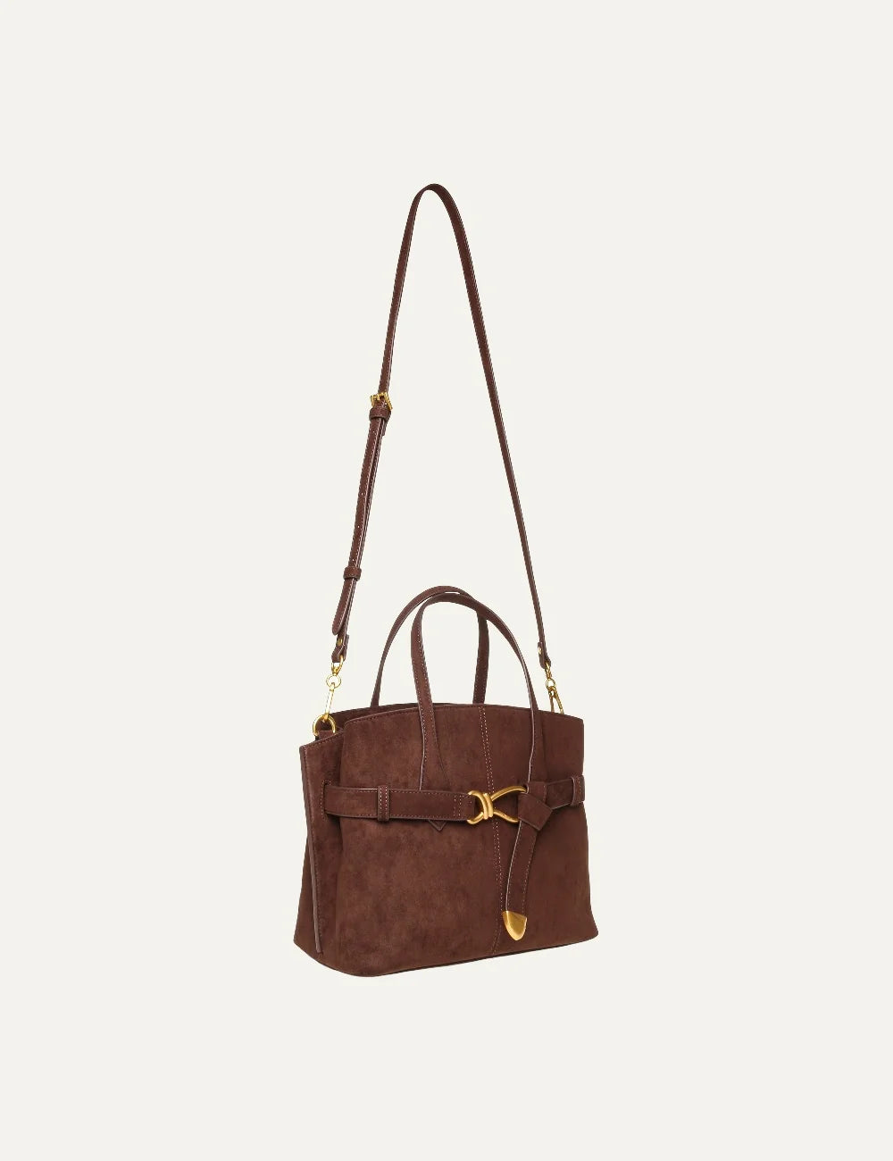Steve Madden BJoplin women's chocolate brown structured tote handbag in suede effect synthetic material, featuring double top handles, front belted detail, gold tone knot hardware and hanging strap accent, side view with strap