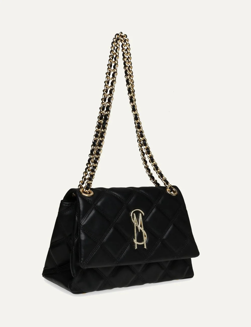 Steve Madden women's black quilted shoulder bag with diamond stitching, gold tone SM logo on front flap, magnetic closure and gold chain strap with woven black detailing, side view