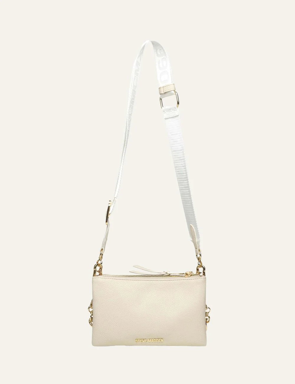 Steve Madden Bnicco women's ecru synthetic leather crossbody bag with embossed front logo, adjustable branded shoulder strap, gold tone chain detail along the bottom and top zip closure,  back view