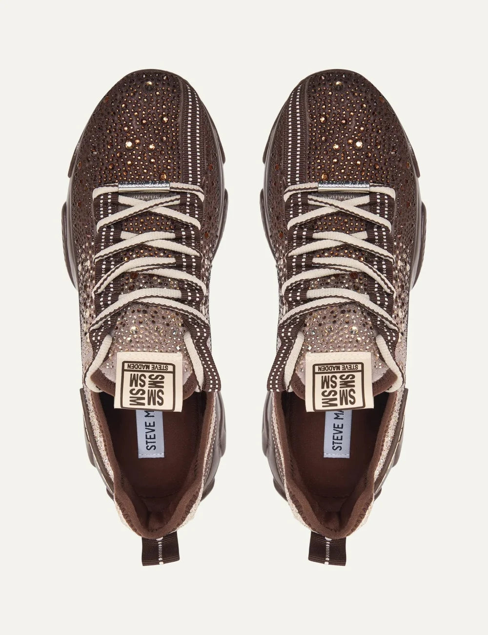 Steve Madden Mistica women's chunky sneakers in brown and taupe, embellished with sparkling rhinestones, featuring a gradient textile upper, beige and brown laces, oversized Steve Madden side logo and glossy brown sculpted sole,  top view