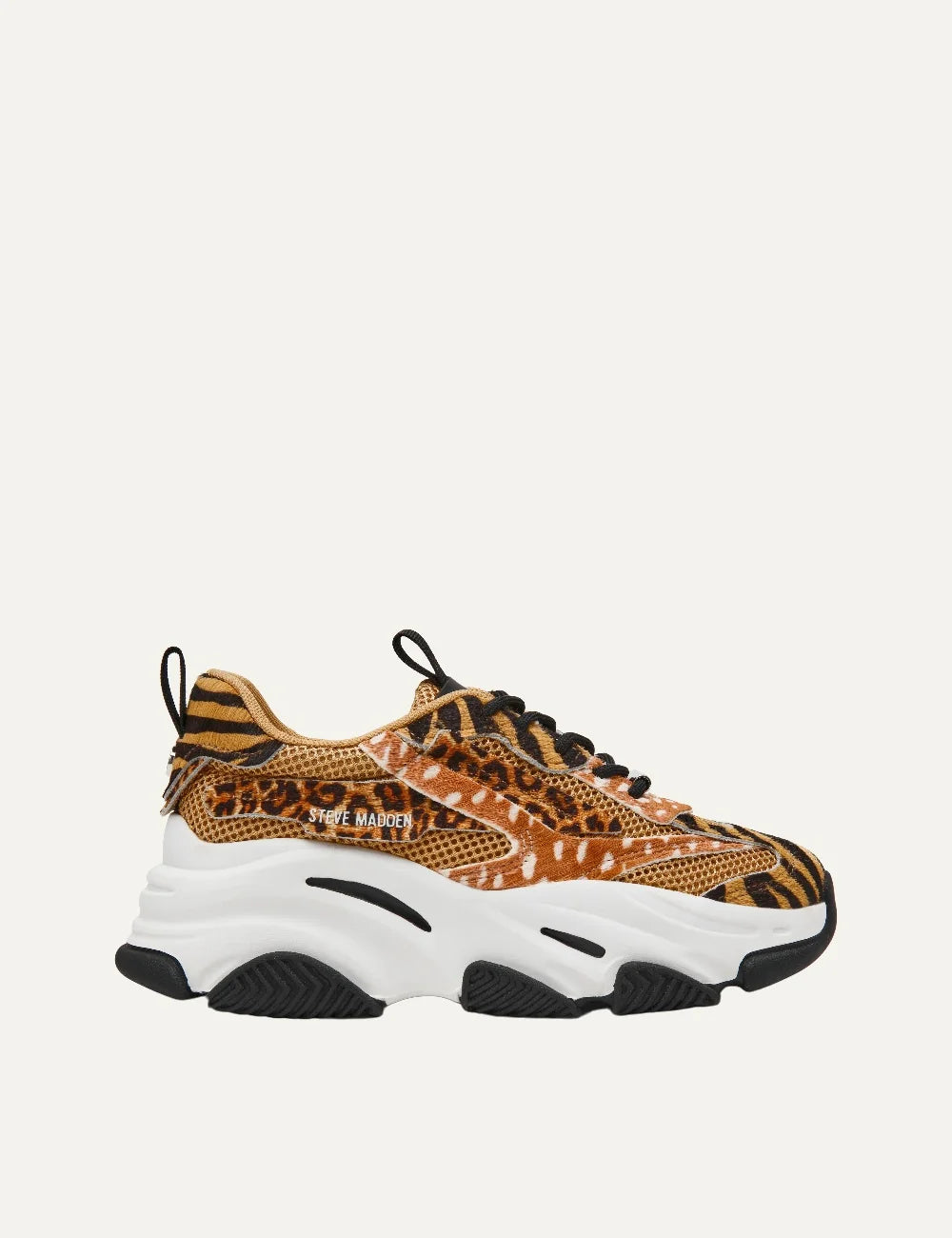 Steve Madden women's chunky sneakers in multicolor animal print with leopard, tiger and deer patterns, breathable mesh panels, black laces, white platform sole and black rubber accents, side view.