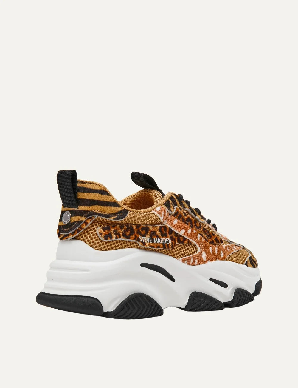 Steve Madden women's chunky sneakers in multicolor animal print with leopard, tiger and deer patterns, breathable mesh panels, black laces, white platform sole and black rubber accents, back view