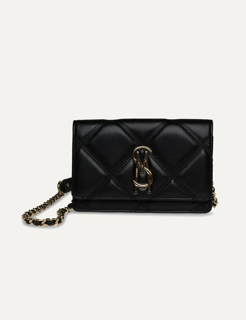 Steve Madden women's black quilted crossbody bag with diamond stitching, gold tone SM logo on front flap, and gold chain strap with woven black detailing, front view.