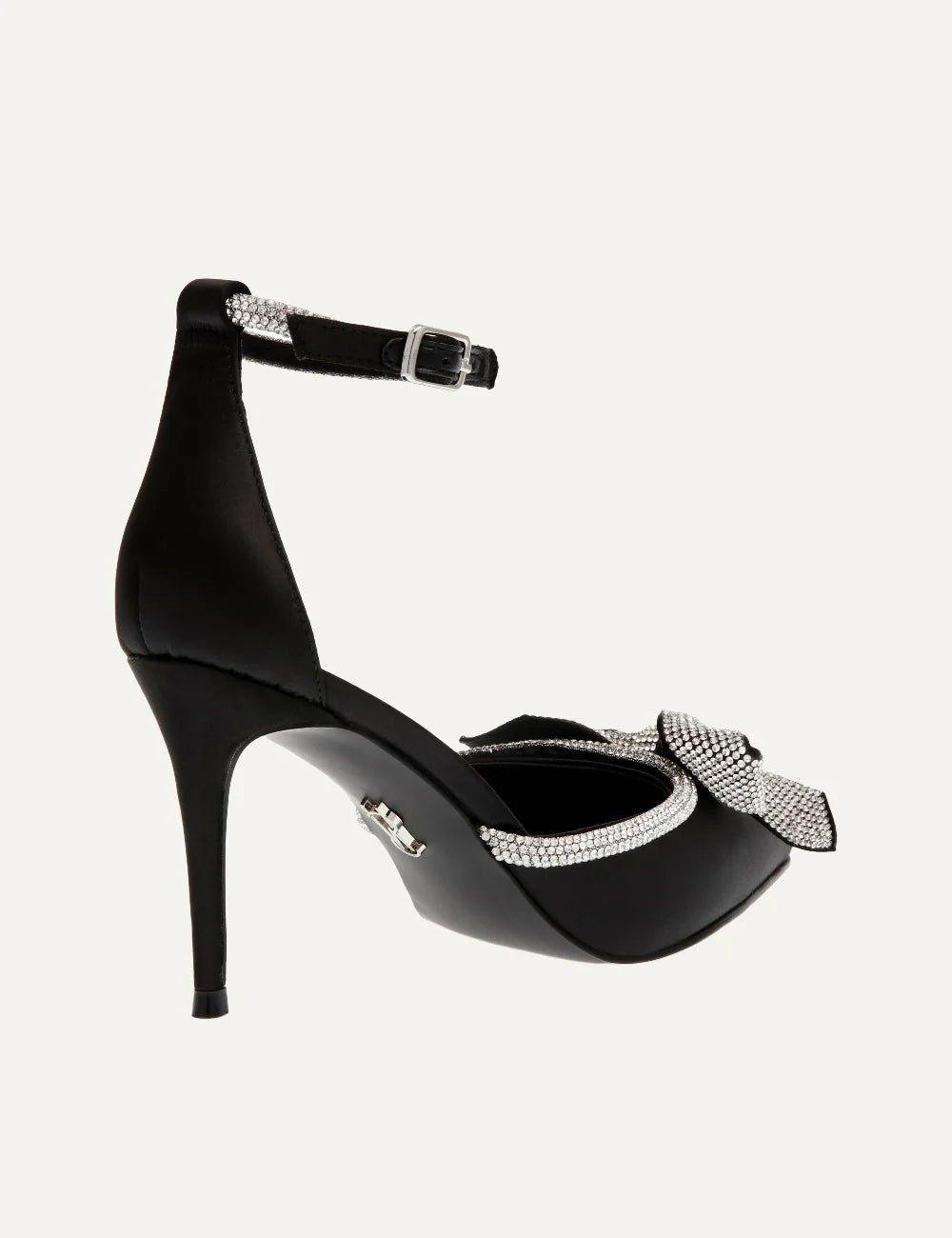 Steve Madden women's black satin pointed toe pumps with sparkling rhinestone bow, crystal embellished trim, adjustable ankle buckle strap and 9 cm stiletto heel, back view