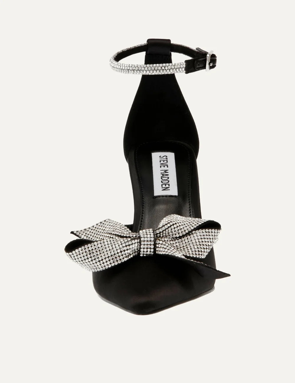 Steve Madden women's black satin pointed toe pumps with sparkling rhinestone bow, crystal embellished trim, adjustable ankle buckle strap and 9 cm stiletto heel, front view