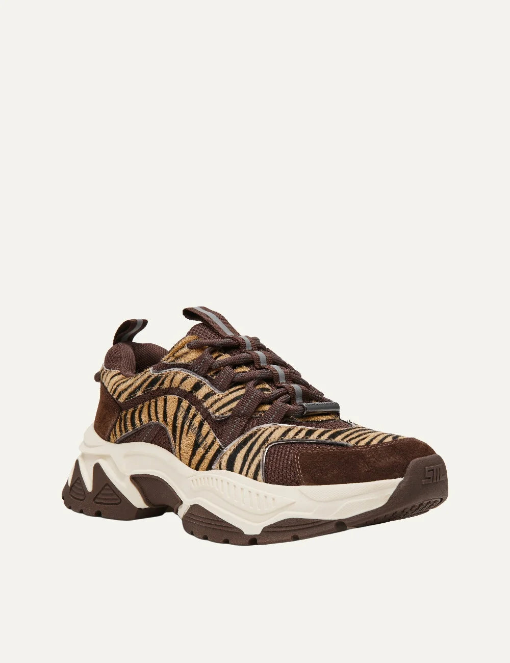 Steve Madden women's chunky sneakers in brown and taupe with tiger stripe patterned fabric panels, dark brown suede overlays, mesh inserts, brown lace-up fastening and oversized cream and brown sculpted sole,  front angle view