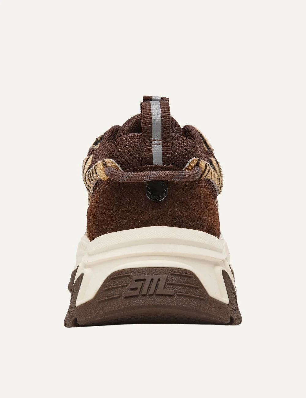 Steve Madden women's chunky sneakers in brown and taupe with tiger stripe patterned fabric panels, dark brown suede overlays, mesh inserts, brown lace-up fastening and oversized cream and brown sculpted sole, back view