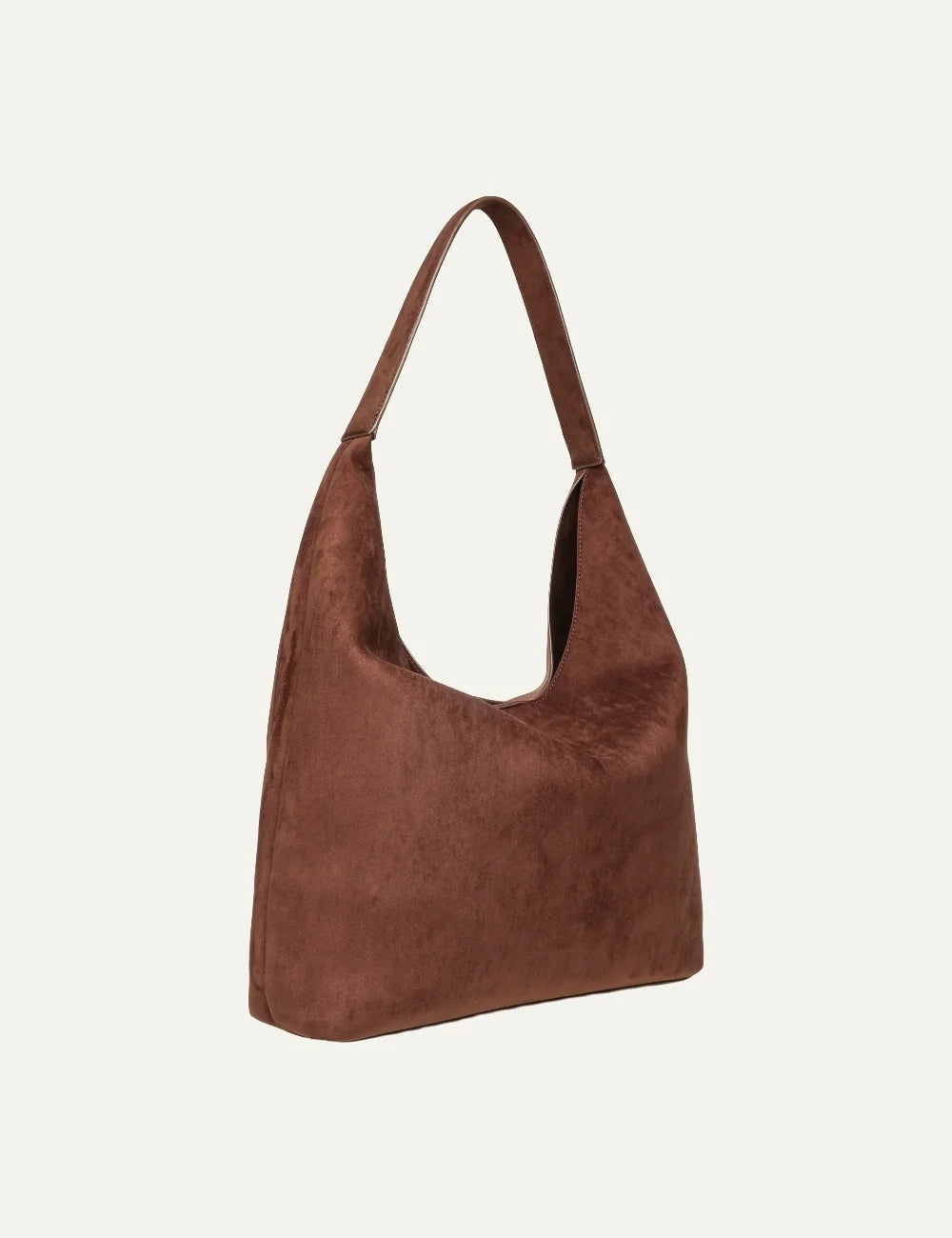 Steve Madden women's chocolate brown suede effect hobo shoulder bag with single long strap, deep U shaped opening, large front patch pocket and gold tone logo, side view