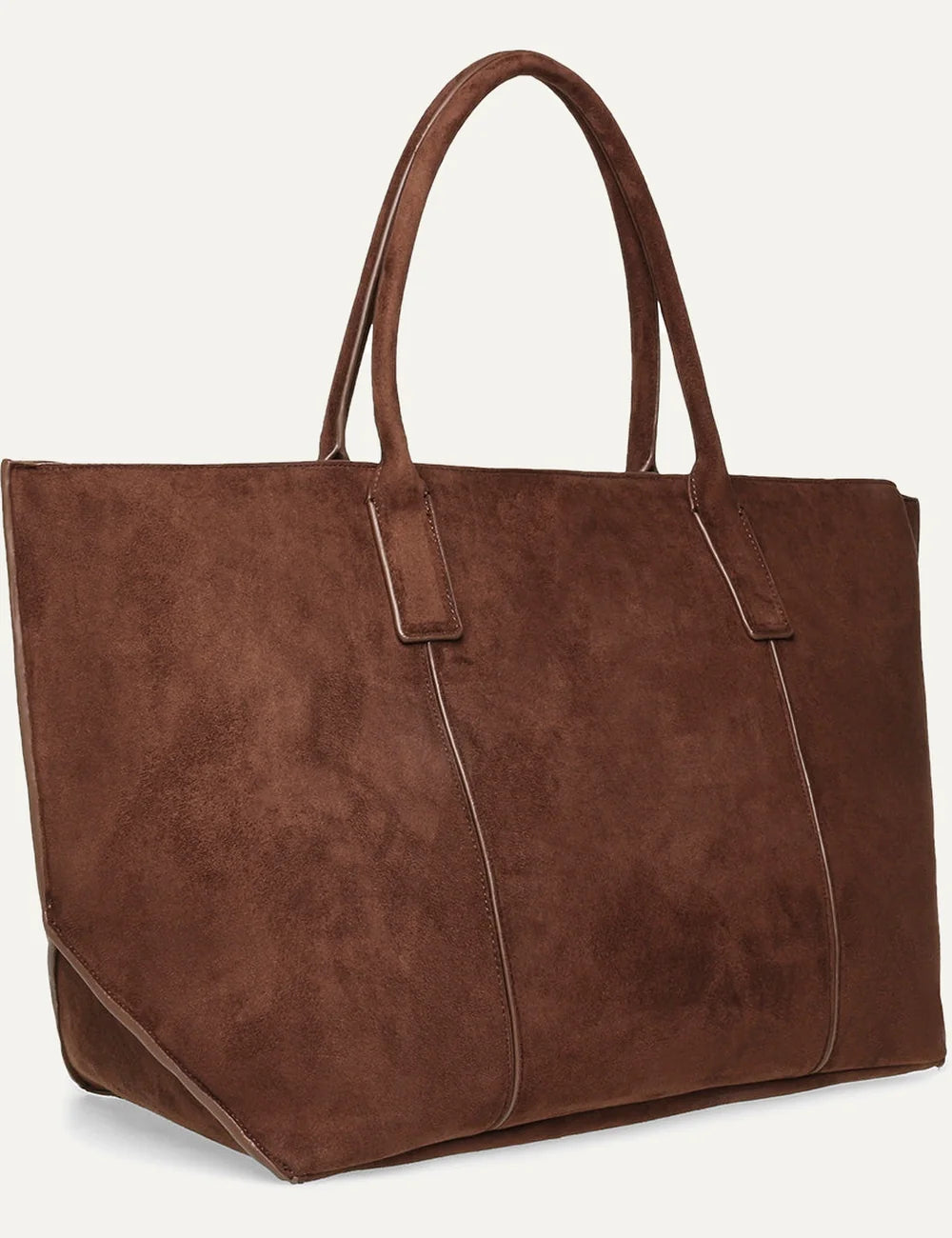 Steve Madden women's chocolate brown suede effect fabric tote bag with spacious trapezoid silhouette, two long shoulder handles, vertical stitched panels and small gold tone logo, side view