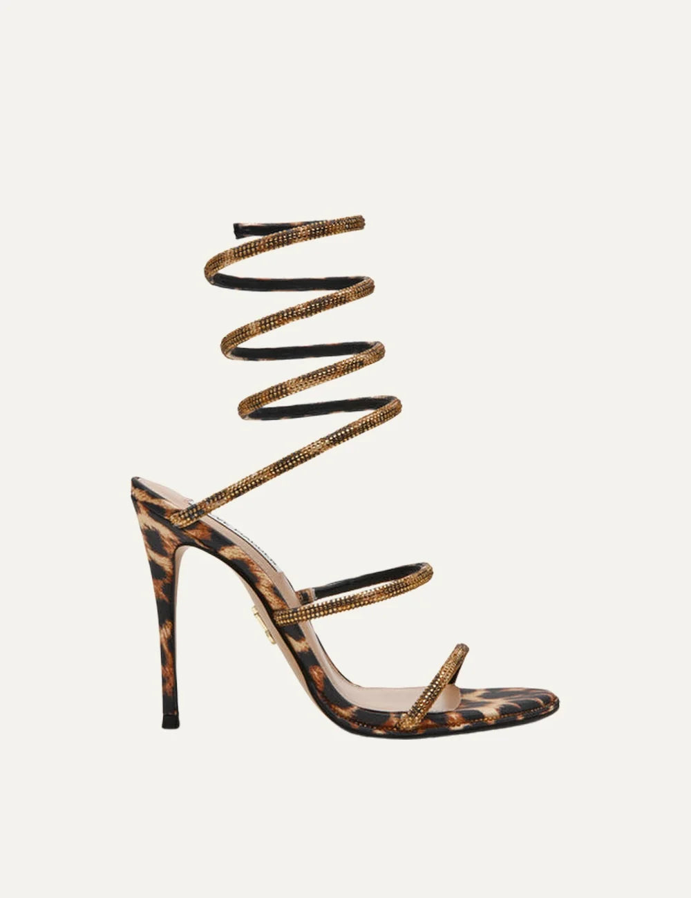 Steve Madden women's leopard print high heel sandals with gold rhinestone embellished straps, spiral wraparound ankle and calf strap, square open toe and 10.2 cm stiletto heel, side view.