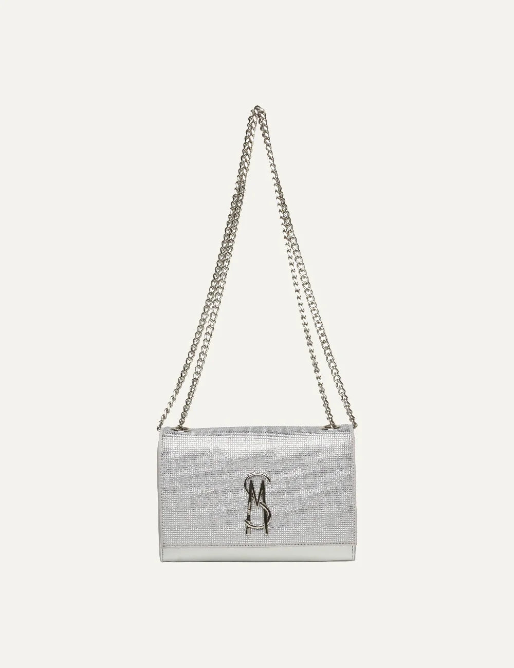 Steve Madden women's silver shoulder bag with sparkling rhinestone embellished flap, silver tone metal logo and double chain shoulder strap, front view.