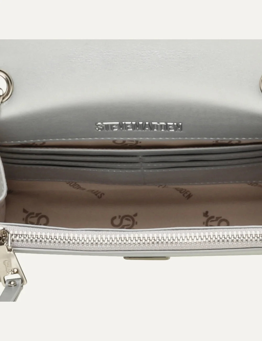 Steve Madden women's silver shoulder bag with sparkling rhinestone embellished flap, silver tone metal logo and double chain shoulder strap,  interior view