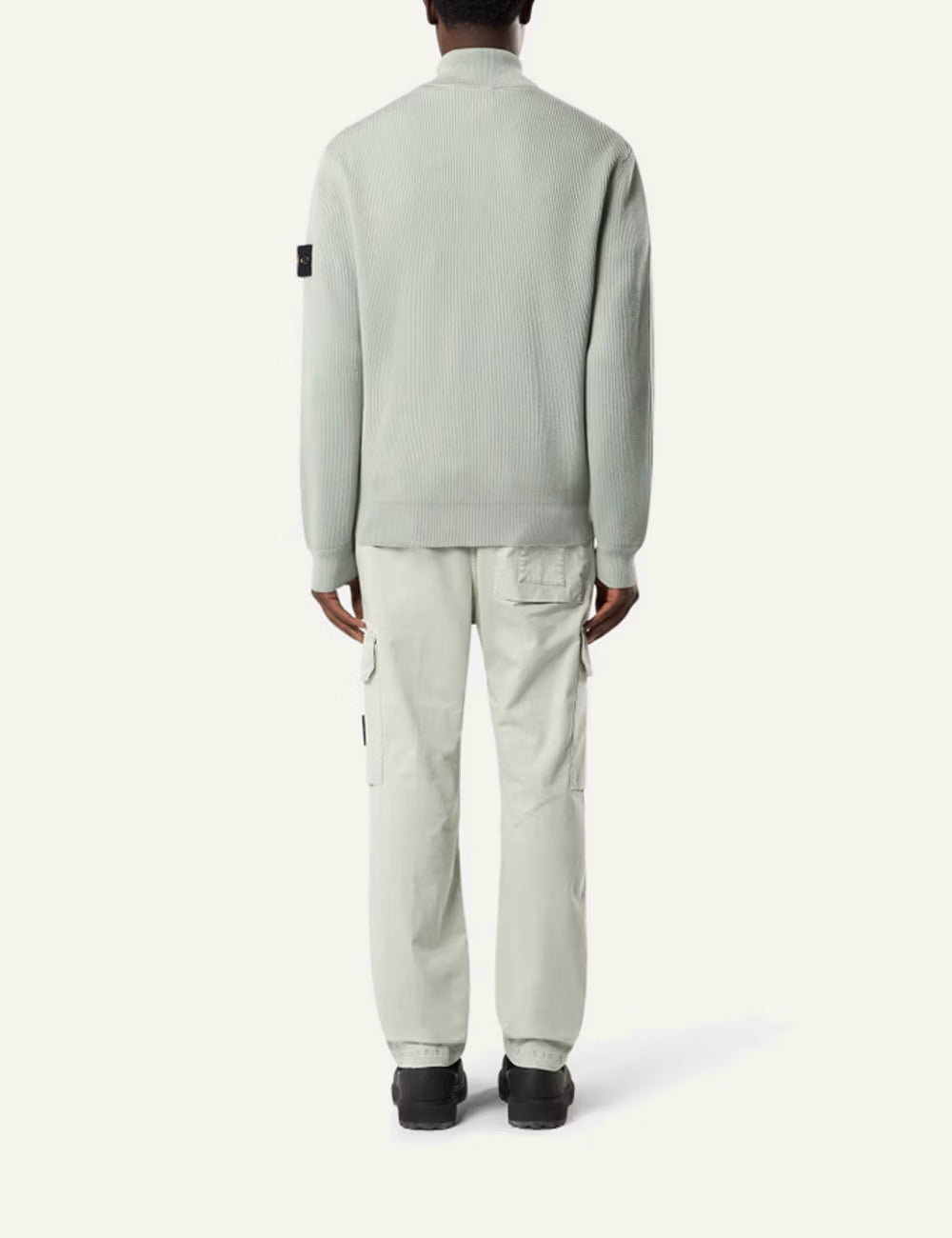 Stone Island cargo trousers in black with side pockets and logo patch back view