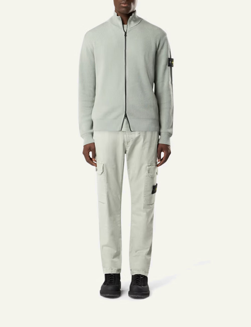 Stone Island cargo trousers in black with side pockets and logo patch front full body view