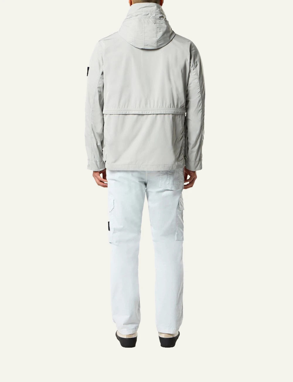 Stone Island cargo trousers in sky blue with side pockets and logo patch back view